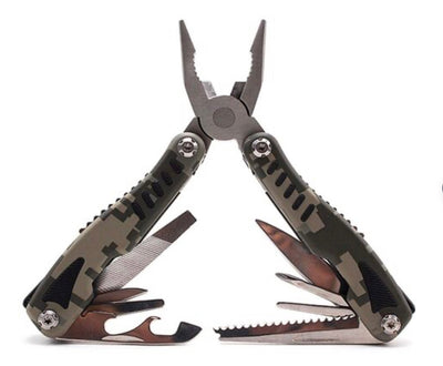Pinza multiherramienta plegable 14 en 1 sobre mesa de trabajo