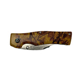 Navaja plegable drop point con acabado camuflado y clip metálico — imagen 3 de 3