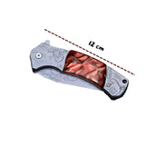 Navaja plegable de 21 cm con hoja clip point grabada con diseños de fauna — imagen 2 de 4