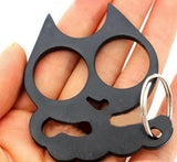 Boxer gato compacto para defensa personal en color dorado — imagen 1 de 2