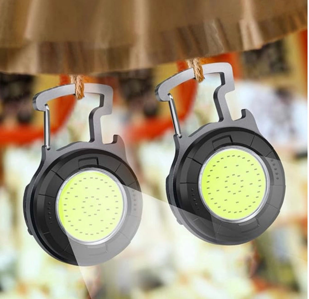 Linterna LED recargable con 4 modos de luz y destapador integrado