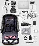 Mochila antirrobo impermeable con puerto USB en azul, negro o gris — imagen 6 de 9